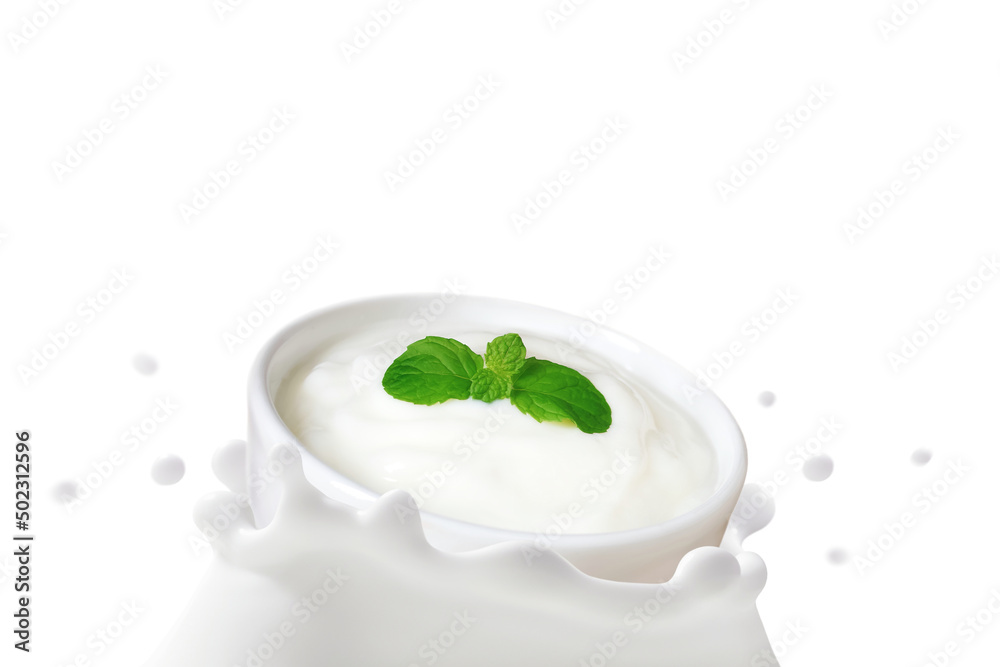 Yogurt in bowl falling in to the milk splashed isolated on white background, The movement of Organic dairy products juicy creamy, Healthy drink probiotic, Ketogenic diet food for health care concept. Yogurt in bowl falling in to the milk splashed isolated on white background, The movement of Organic dairy products juicy creamy, Healthy drink probiotic, Ketogenic diet food for health care concept.