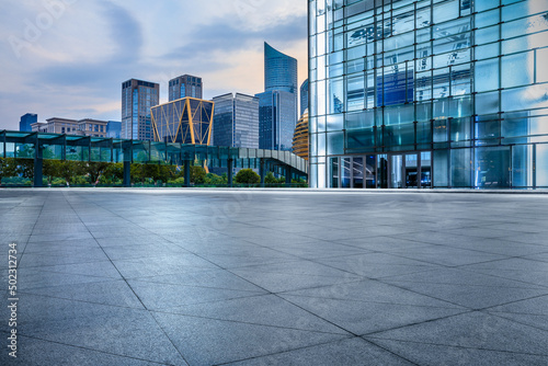 Fotobehang Empty square floor and city skyline with modern commercial buildings in Hangzhou, China