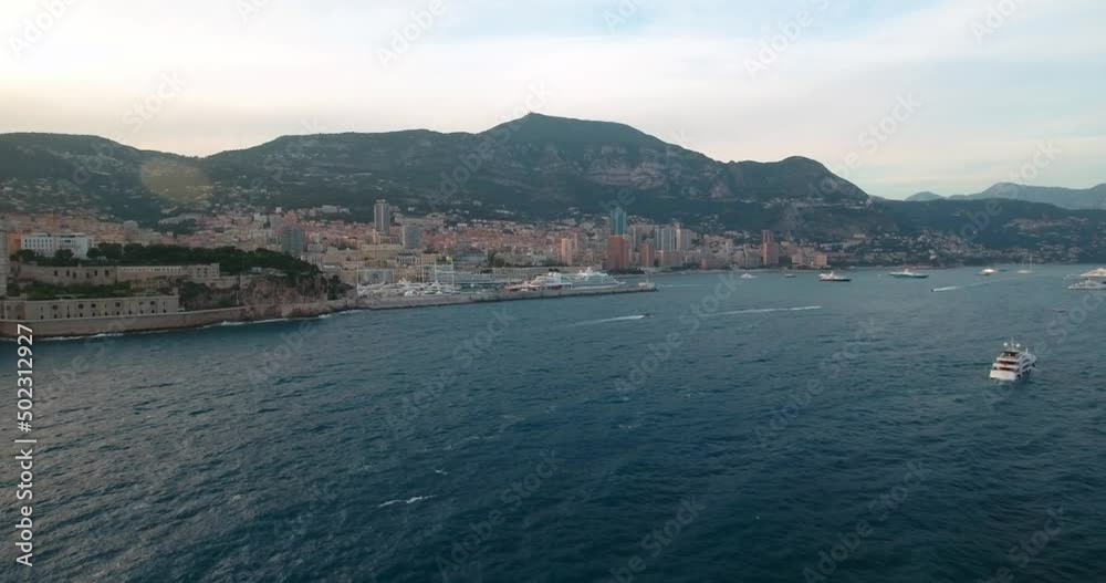 Aerial Beautiful Shot Of Buildings On Mountains, Drone Flying Forward Over Sea - Monaco Aerial Beautiful Shot Of Buildings On Mountains, Drone Flying Forward Over Sea - Monaco