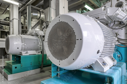 Powerful electric motors of vibrating mills in workshop