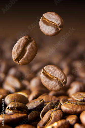 Coffee beans. Macro coffee beans levitating.