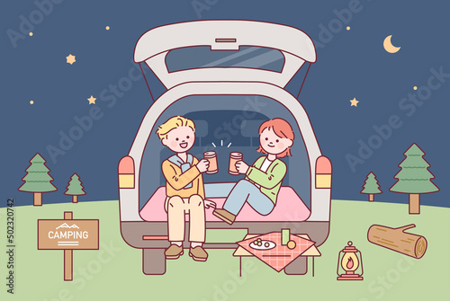 A couple is camping in the trunk of a car. Late night nature background. flat design style vector illustration.