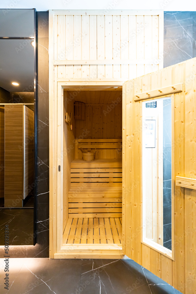 Small home wooden sauna, spa room. Relax in a hot sauna.