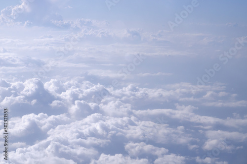 Fototapeta Naklejka Na Ścianę i Meble -  Beautiful cloudy sky from aerial view background. Airplane view above clouds. Sky and cloud texture.