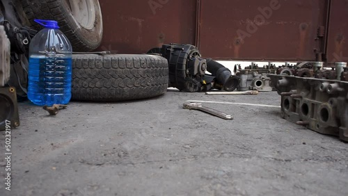 auto parts lie on asphalt closeup
