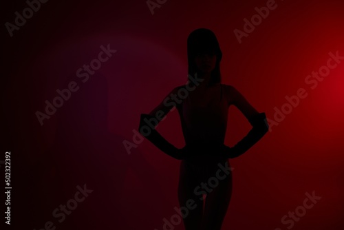 Neon scene silhouette woman red light
