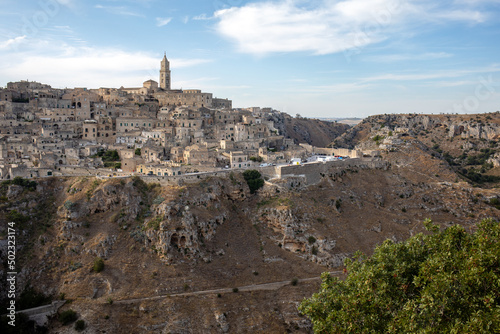 Panoramic view of Sassi di Matera a historic district in the city of Matera, well-known for their ancient cave dwellings from the Belvedere di Murgia Timone,  Basilicata, Italy © wjarek