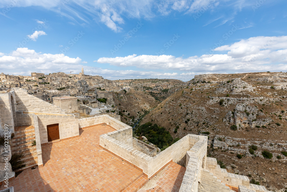 View of the Sassi di Matera a historic district in the city of Matera, well-known for their ancient cave dwellings. Basilicata. Italy