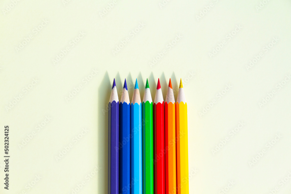 Numerous, bright pencils for drawing in an album in drawing classes. Numerous, bright pencils for drawing in an album in drawing classes.