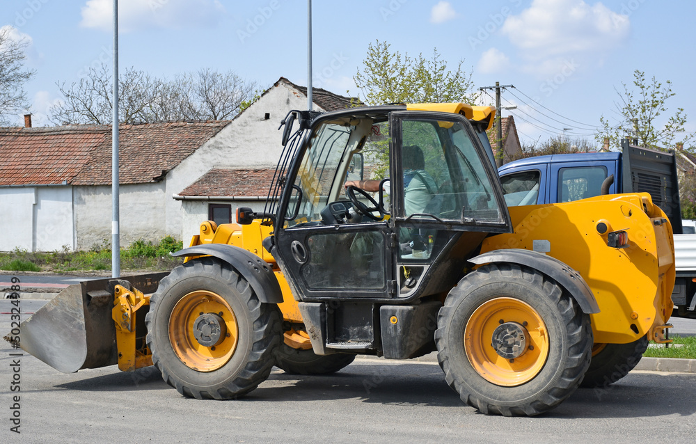 Excavator at the road construction site