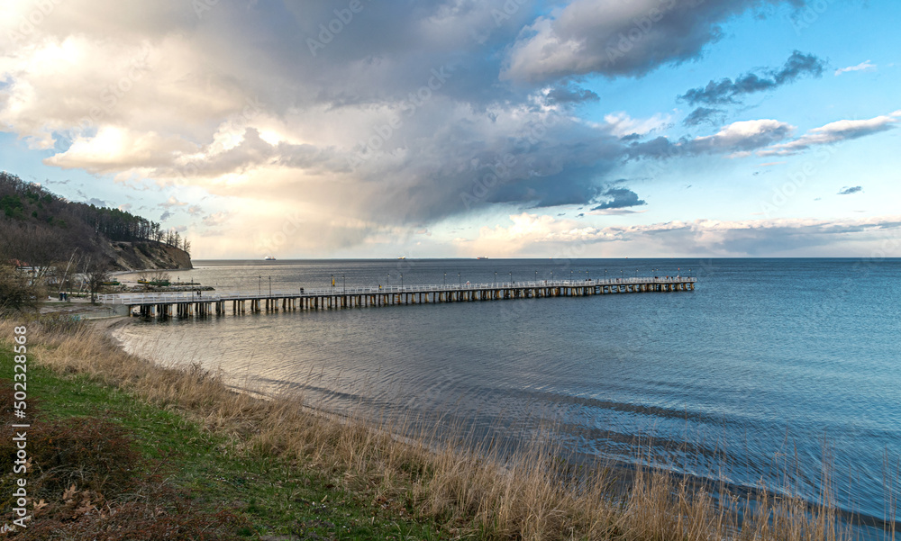 Rocks and sandy beach on the coast of the Baltic Sea in Gdynia	