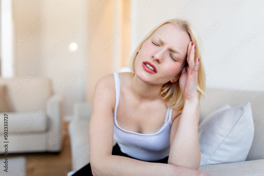 Sinus ache causing very paintful headache. Unhealthy woman in pain. Sharp strong sore. Sinus pain, sinus pressure, sinusitis. Sad woman holding her head because sinus pain Sinus ache causing very paintful headache. Unhealthy woman in pain. Sharp strong sore. Sinus pain, sinus pressure, sinusitis. Sad woman holding her head because sinus pain