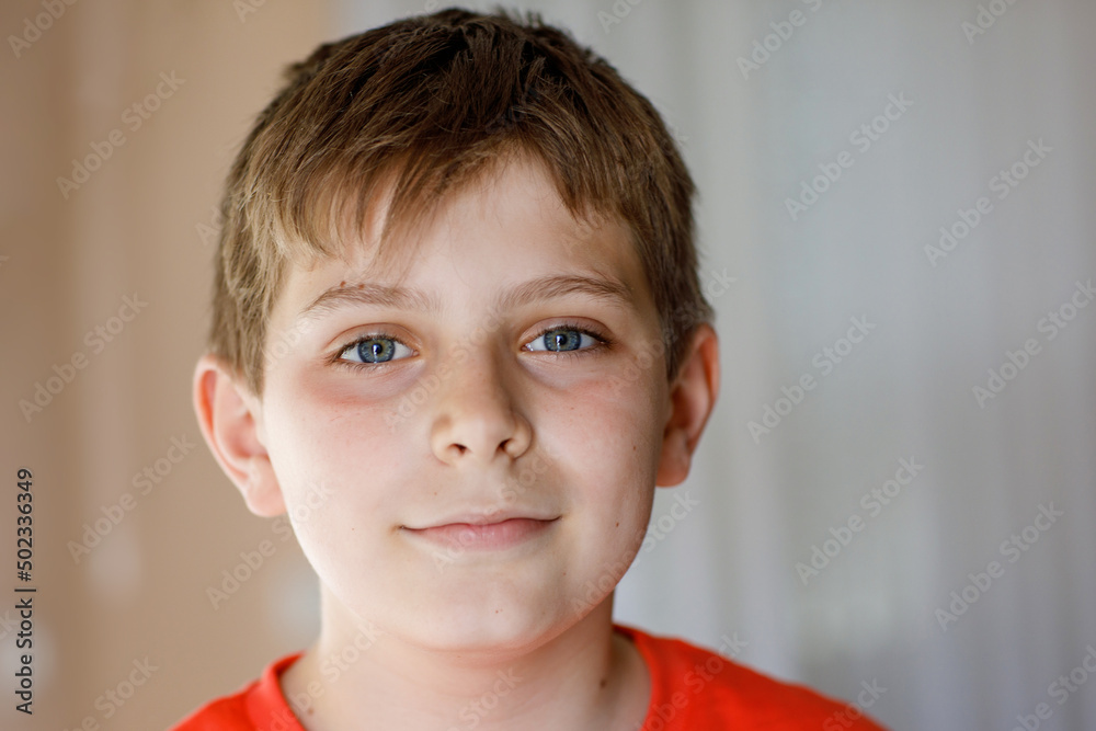 Portrait of preteen school kid boy. Beautiful happy child looking at the camera. Schoolboy smiling. Education concept. Portrait of preteen school kid boy. Beautiful happy child looking at the camera. Schoolboy smiling. Education concept.