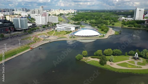 Minsk city landscape in the summer, Belarus. Aerial view of Nemiga. View at island of Tears memorial, Traetskae Pradmestse (Trinity Suburb) and upper town in Minsk. photo