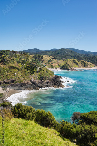 Landscape view on the Bay Of Islands  Northland  New Zealand on a sunny day with pure blue sky above the turquoise waters of the pacific ocean 