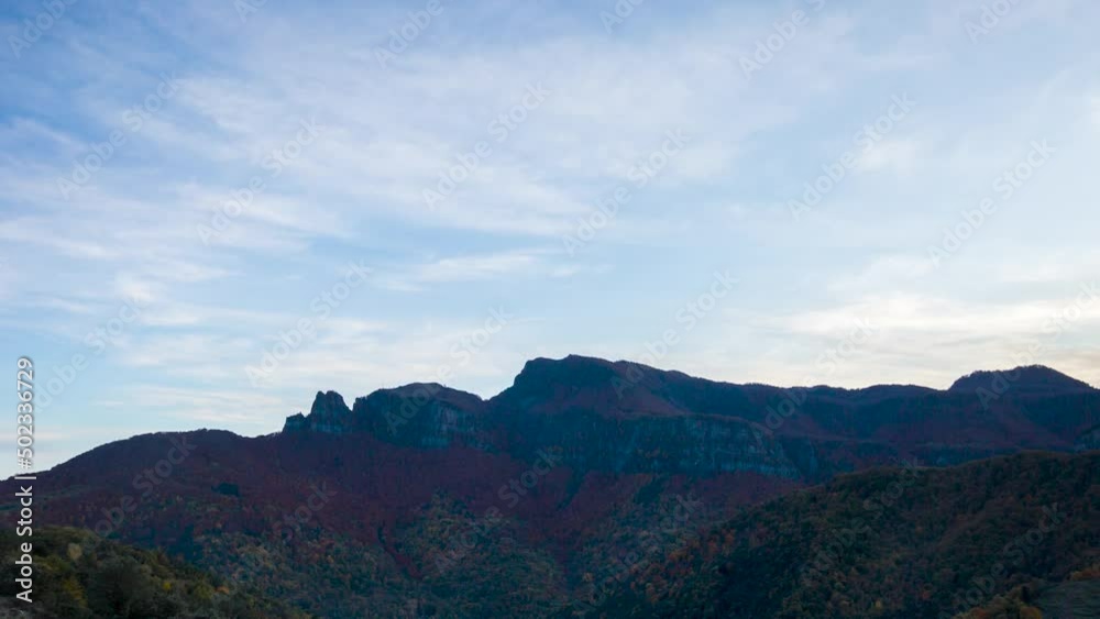 Time lapse scene of autumn sunset in Puigsacalm peak, La Garrotxa, Spain Time lapse scene of autumn sunset in Puigsacalm peak, La Garrotxa, Spain