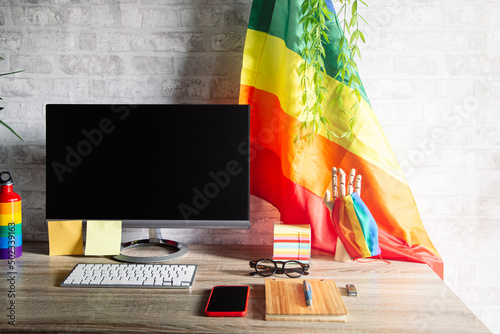 Office with LGBT accessories and decoration. LGBTQ culture