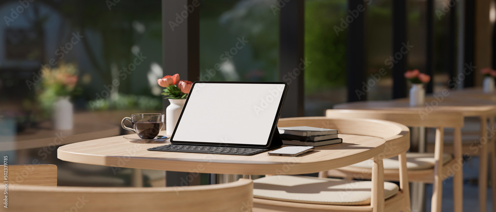 Working space in a modern restaurant with portable tablet Working space in a modern restaurant with portable tablet