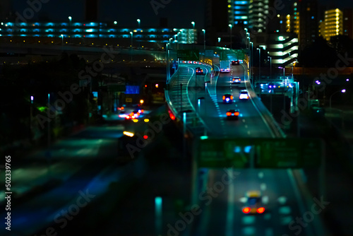 A night miniature traffic jam at the urban street in Tokyo