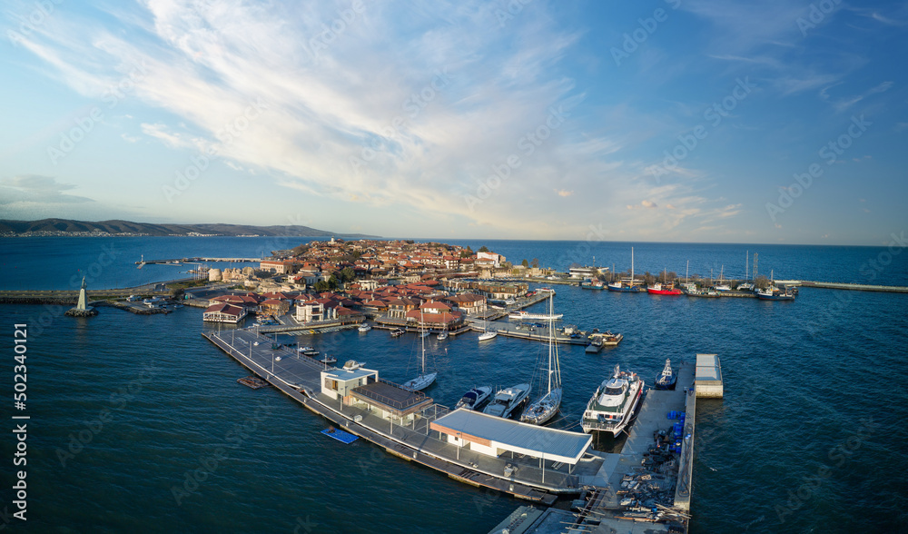 Panorama view from a height of the city of Nessebar with houses and parks washed by the Black Sea in Bulgaria