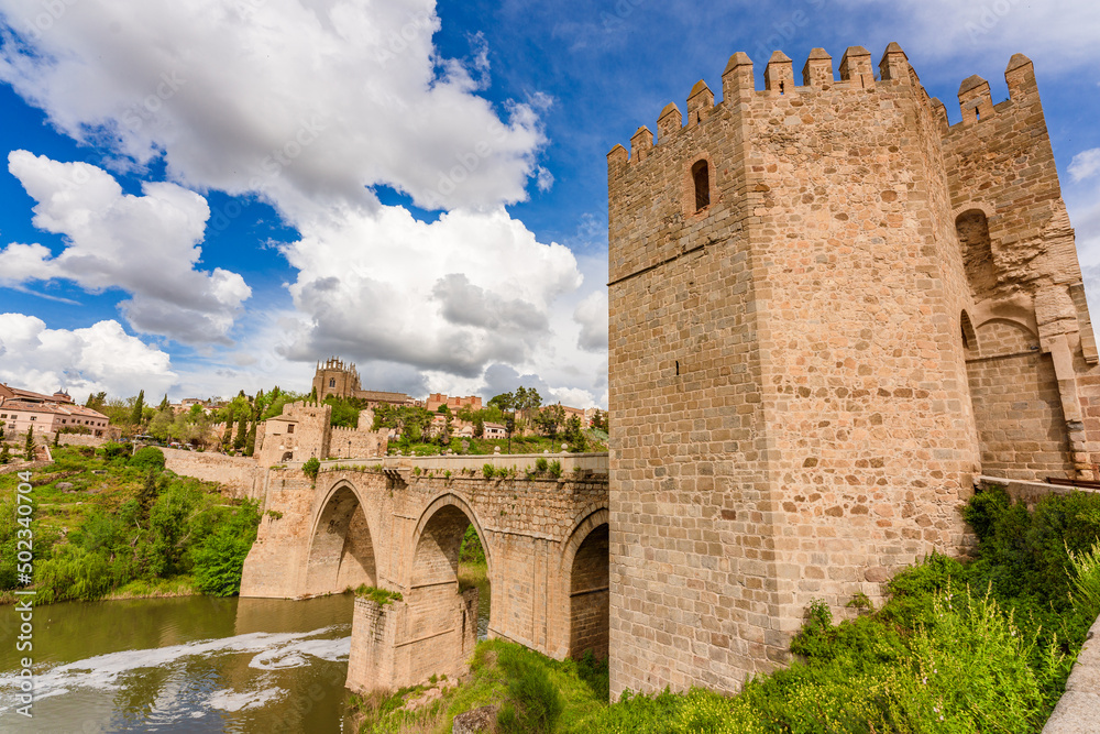 Scenic view of medieval pedestrian San Martin's bridge offering sweeping views of the Tagus River in Toledo, Spain