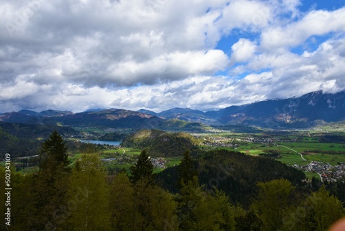 View of rural landscape around the town of Bled and Bled lake in Gorenjska, Slovenia with Karavanke mountains and Mezakla