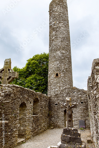 Muiredach's Cross, Monasterboice Monastery in southern Ireland. Celtic High Cross in the historic ruins of Monasterboice, an early Christian settlement near Drogheda in County Louth, Ireland photo