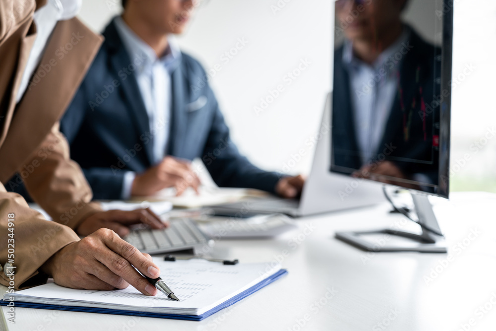 Business team investment working with computer, planning and analyzing graph stock market trading with stock chart data, business financial investment and technology concept Business team investment working with computer, planning and analyzing graph stock market trading with stock chart data, business financial investment and technology concept