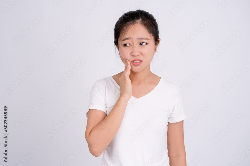 Portrait of asian female feeling painful toothache. Teeth problem woman feeling tooth pain. Dental healthcare concept. Portrait of asian female feeling painful toothache. Teeth problem woman feeling tooth pain. Dental healthcare concept.