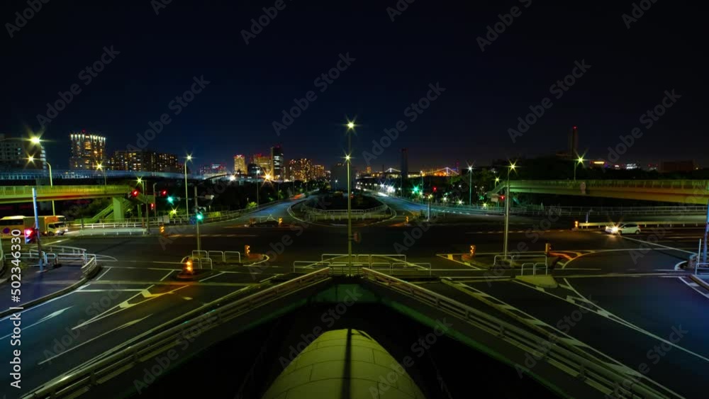 A night timelapse of the traffic jam at the urban street in Tokyo wide shot tilt A night timelapse of the traffic jam at the urban street in Tokyo wide shot tilt