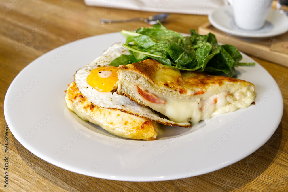 Croque monsieur or madame French food with bulls eye egg