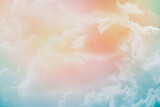 blurred fluffy cloudy sky with pastel gradient color and grunge texture for nature abstract background