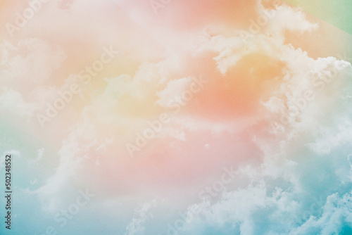 blurred fluffy cloudy sky with pastel gradient color and grunge texture for nature abstract background