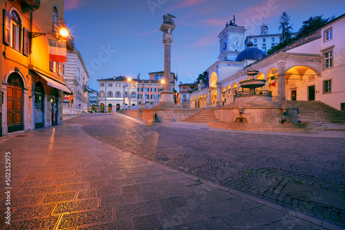 Udine, Italy. Cityscape image of downtown Udine, Italy with town square at sunrise. photo