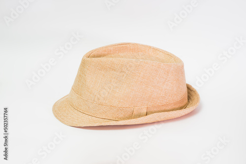 Unisex hat in beige color isolated on white background.
