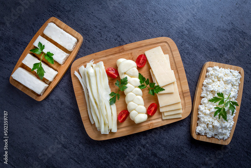 Traditional various cheeses, string, knitted and cecil cheese, turkish delicatessen concept photo