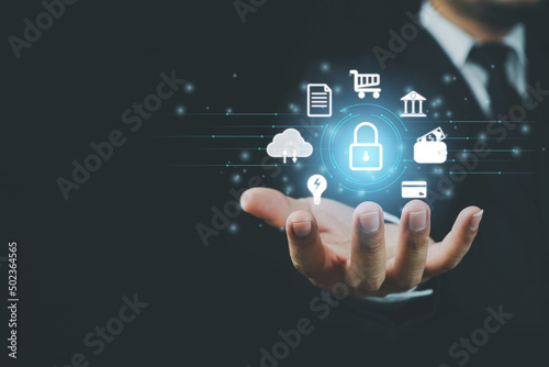 Concept Internet security and cyber network to protect data. businessman's hand works holding a key lock and internet network security technology, business hand security ideas.