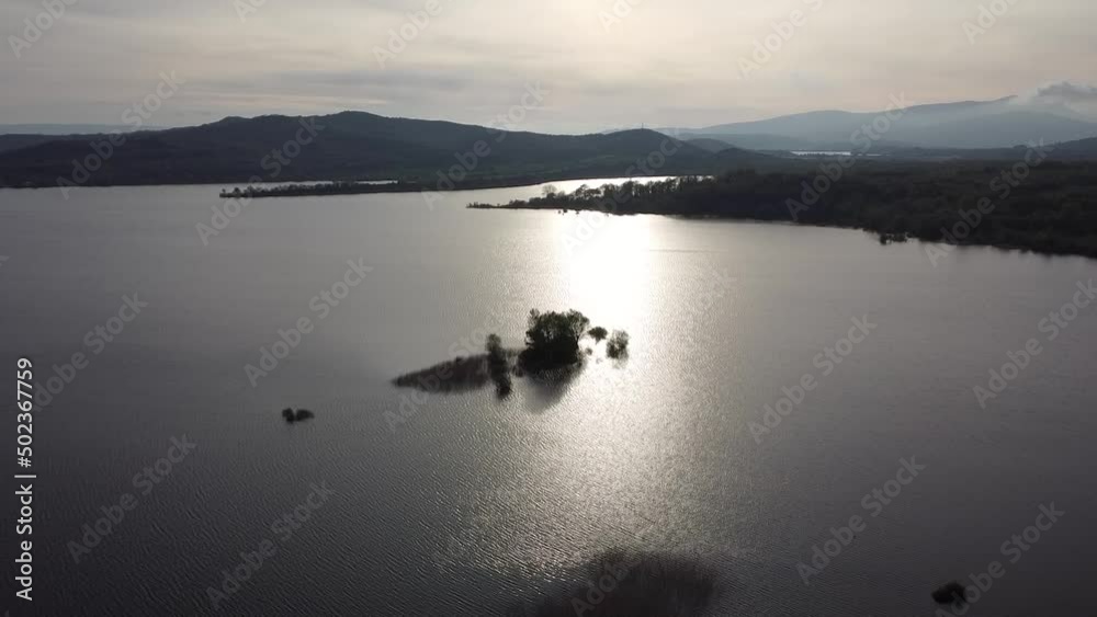 aerial shot of a lake in the green fields of the basque country aerial shot of a lake in the green fields of the basque country