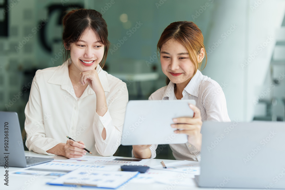 Group of IT consultant working by digital tablet and management big data and analyze financial document of company. Group of IT consultant working by digital tablet and management big data and analyze financial document of company.