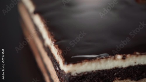 Chocolate dessert is broken with a spoon.