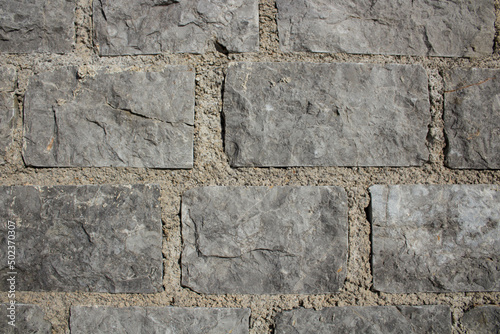 evocative image of the surface of old porous tuff bricks 