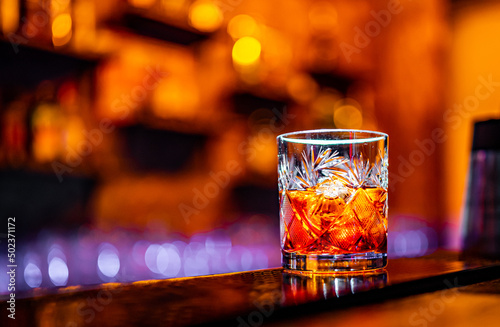 Cocktail Negroni with gin, campari martini rosso and orange. negroni cocktail at the bar