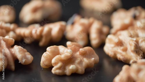 Walnuts are drizzled with chocolate.