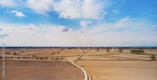 Aerial view of empty paddies waiting for the rain to fall during a period of drought in the Lomellina region, Po Valley, Italy. photo