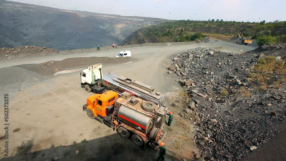 Equipment for blasting soil in an iron ore quarry. Equipment for explosives in the quarry. Heavy equipment in the quarry