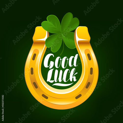 Golden horseshoe with four leaf clover. Calligraphy lettering Inscription Good Luck. Vector Illustration