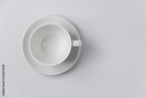 Cup of black coffee top view on a white background. 