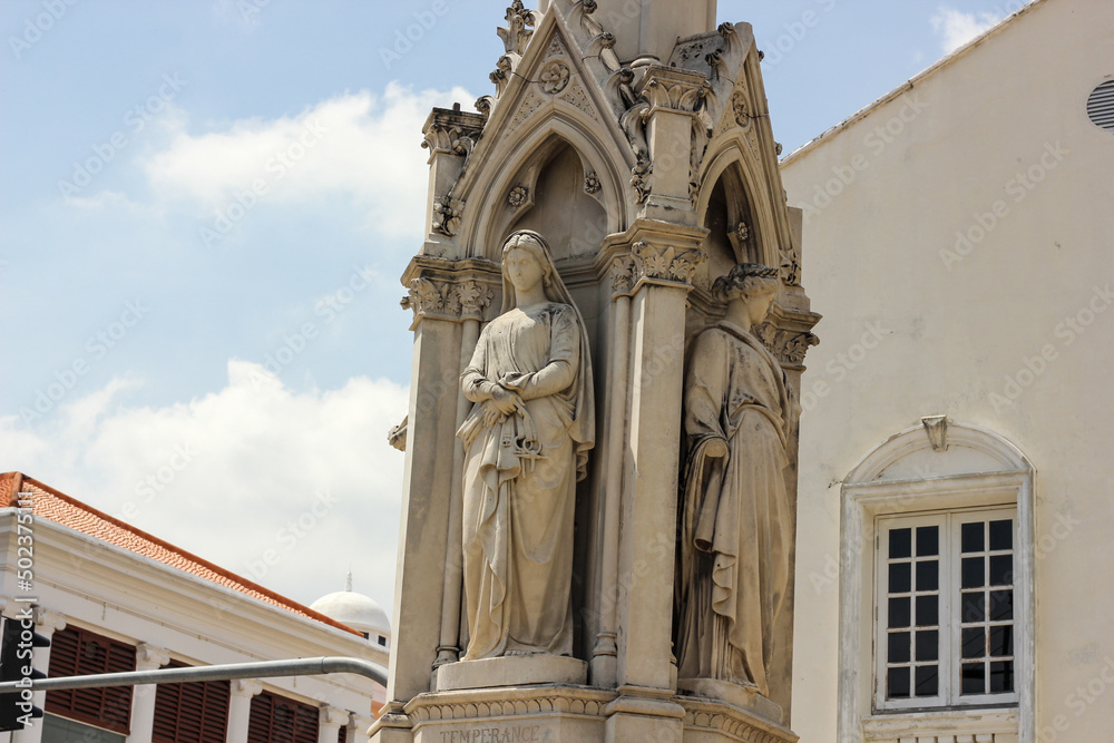 Beautiful ruined British colonial era statues in the historic Unesco heritage site of George Town in Penang.