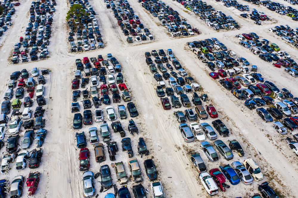 Aerial view of many vehicles in a car park junkyard, Palmdale, Florida