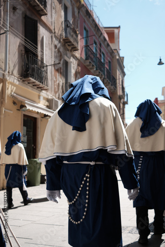 APRIL - ITALY 2022 - group of people with traditional Religion dress during Ceremony during easter - Cagliari Sardinia. © Alessandro